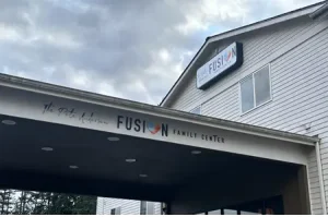 Entrance to The Pete Anderson FUSION Family Center on a cloudy day.